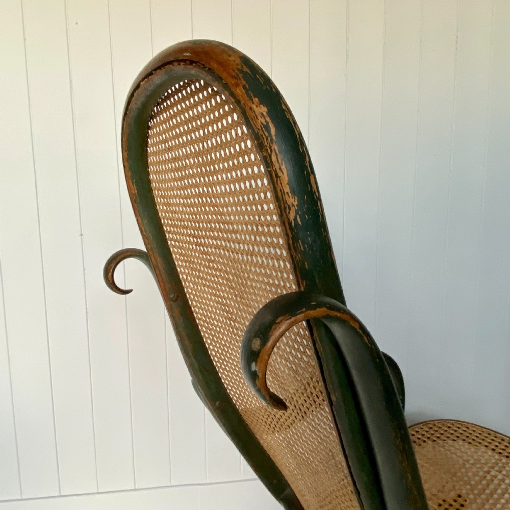 A Thonet Painted Bentwood and Cane Rocking Chair View V