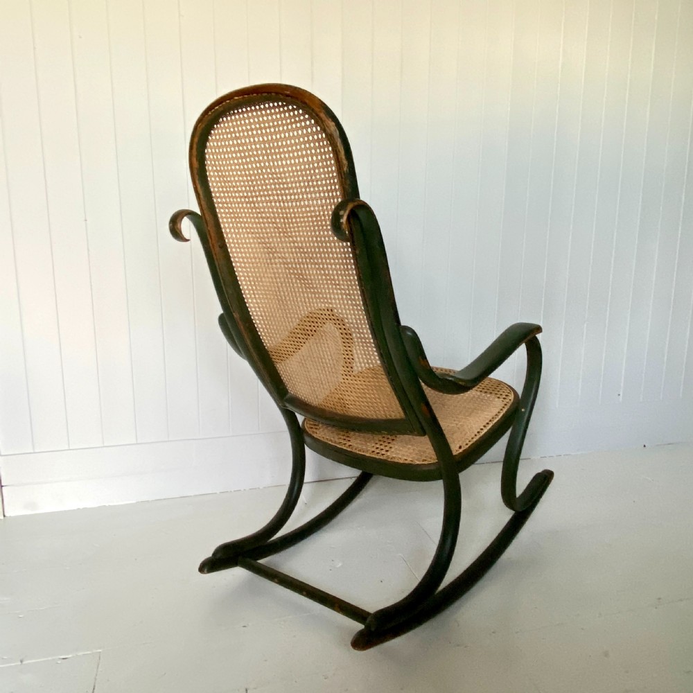 A Thonet Painted Bentwood and Cane Rocking Chair View VI