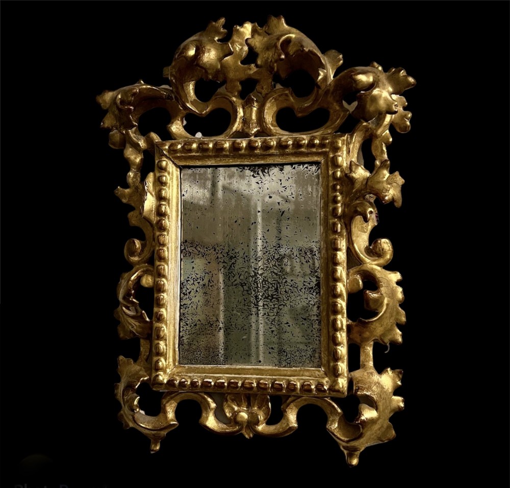 A Small Antique Florentine Giltwood Mirror