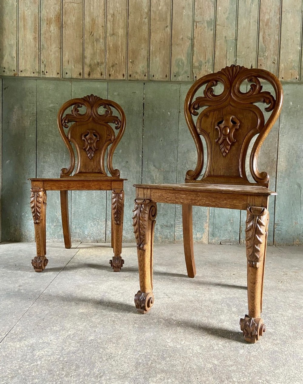 A Pair of C19th Carved Oak Hall or Side Chairs