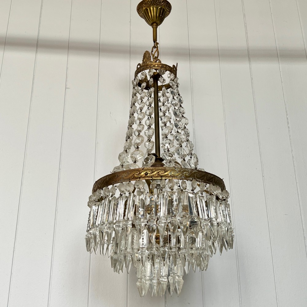 A Tent and Tiered Vintage Chandelier