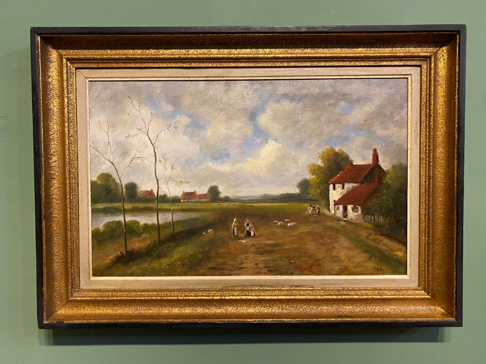 A framed 19th-century oil painting on canvas depicting a rural farmland landscape with a white cottage, figures, livestock, a pond, and a cloudy sky set in a textured gilt frame.