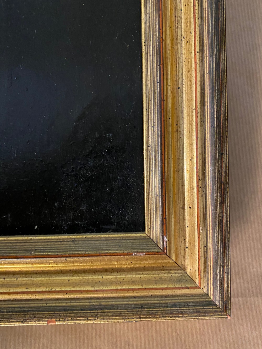 A 19th-century oil painting on canvas depicting a red-haired gentleman in a black coat and white cravat, set inside a gold gilt frame. View IV