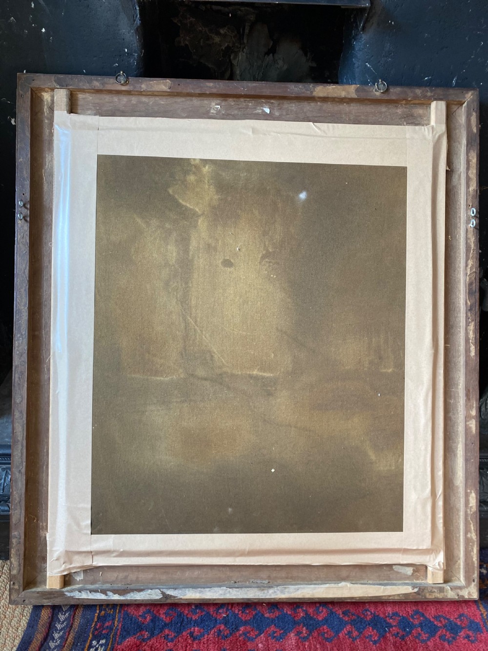 An 18th-century oil painting depicting a gentleman wearing a powdered wig and white cravat, framed within a wide oak wood border. View VII