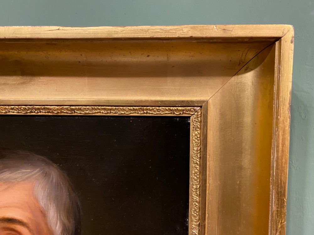 A 19th-century oil portrait depicting a gentleman with grey hair, a yellow collar, and a fur-trimmed coat, framed within a molded giltwood frame. View VI