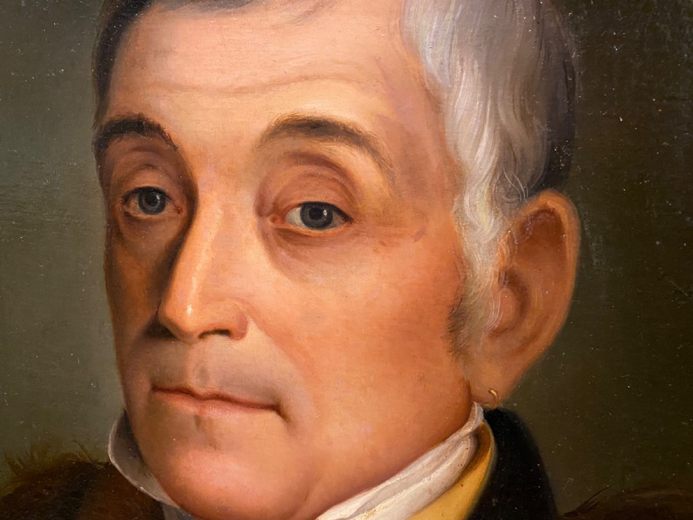 A 19th-century oil portrait depicting a gentleman with grey hair, a yellow collar, and a fur-trimmed coat, framed within a molded giltwood frame. View VII
