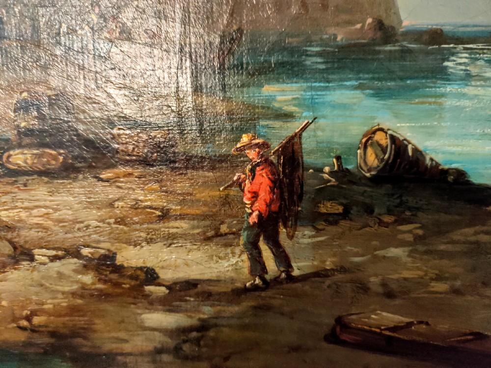 A 19th-century oil painting depicting fishermen and sailing vessels in a coastal harbour, housed in an ornate gilt swept frame. View III