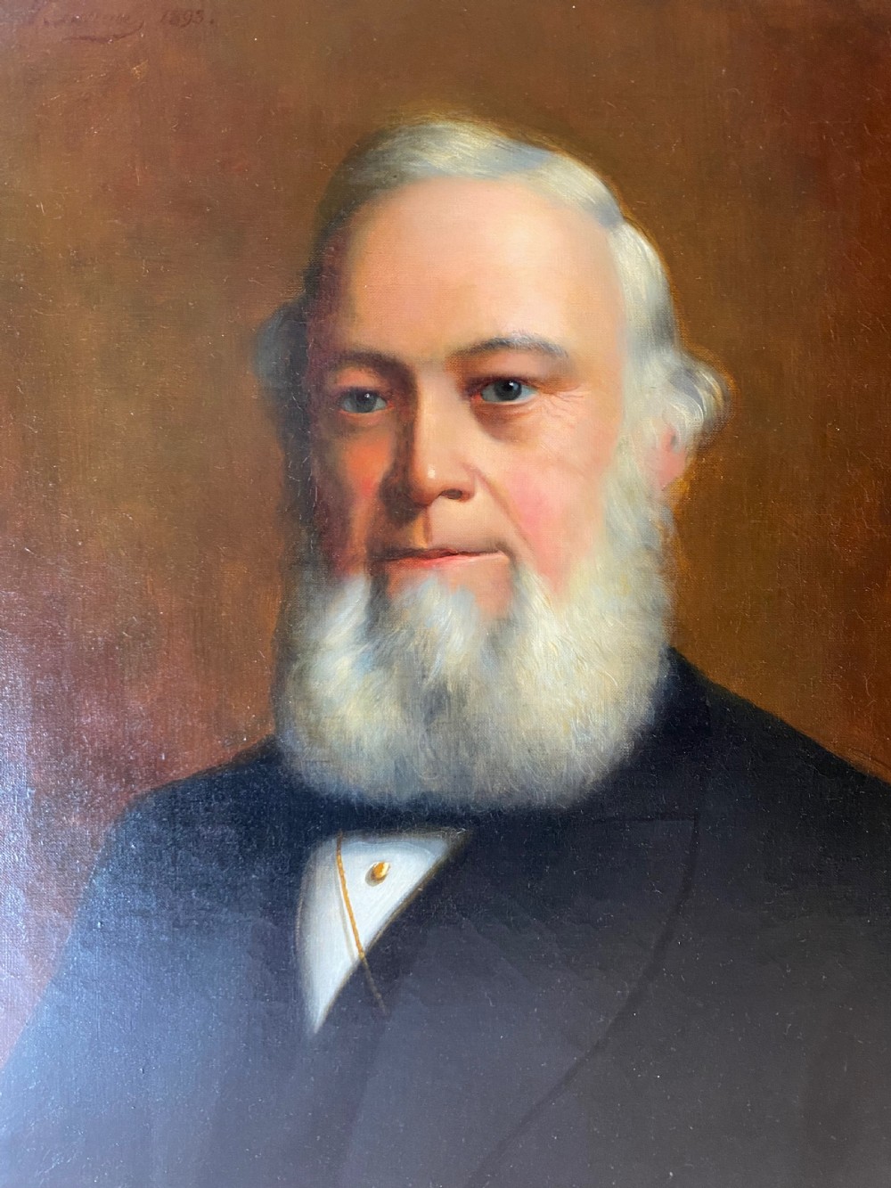 A Victorian oil portrait depicting a white-bearded gentleman in dark formal attire inside an ornate giltwood frame. View III