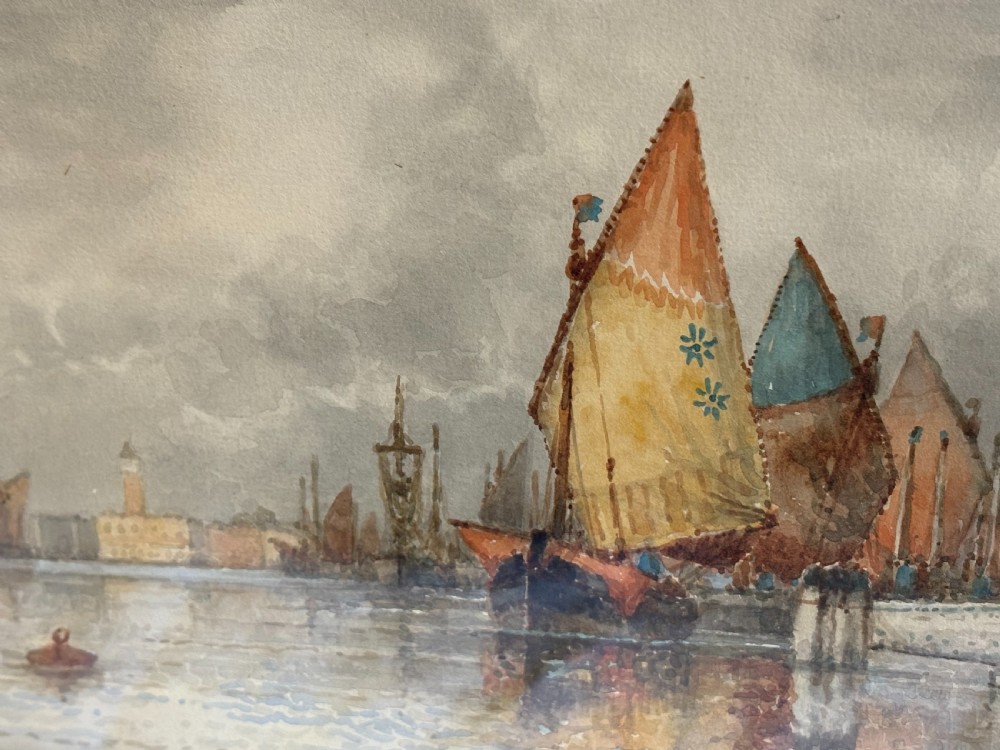 A framed 19th-century watercolour painting depicting sailing vessels on the Venice Grand Canal set inside a double mount and a gilded wooden frame. View VI