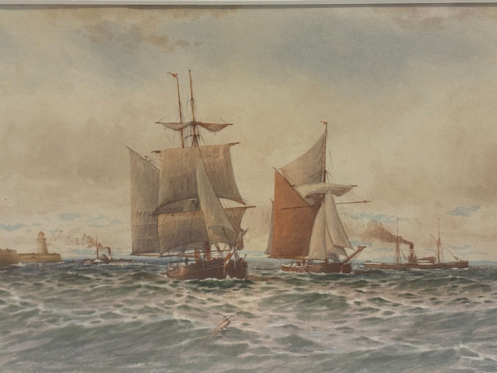 An Edwardian watercolour seascape depicting sailboats navigating choppy coastal waters near a distant lighthouse, presented in a gilt frame. View IV