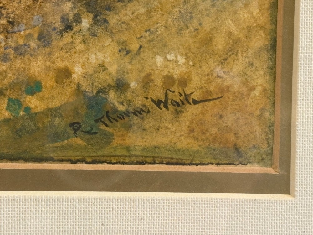 A framed Victorian watercolour painting by Robert Thorne Waite depicting cattle grazing beside a river in a pastoral landscape, set within a wide mount and a fluted gilt frame. View IV
