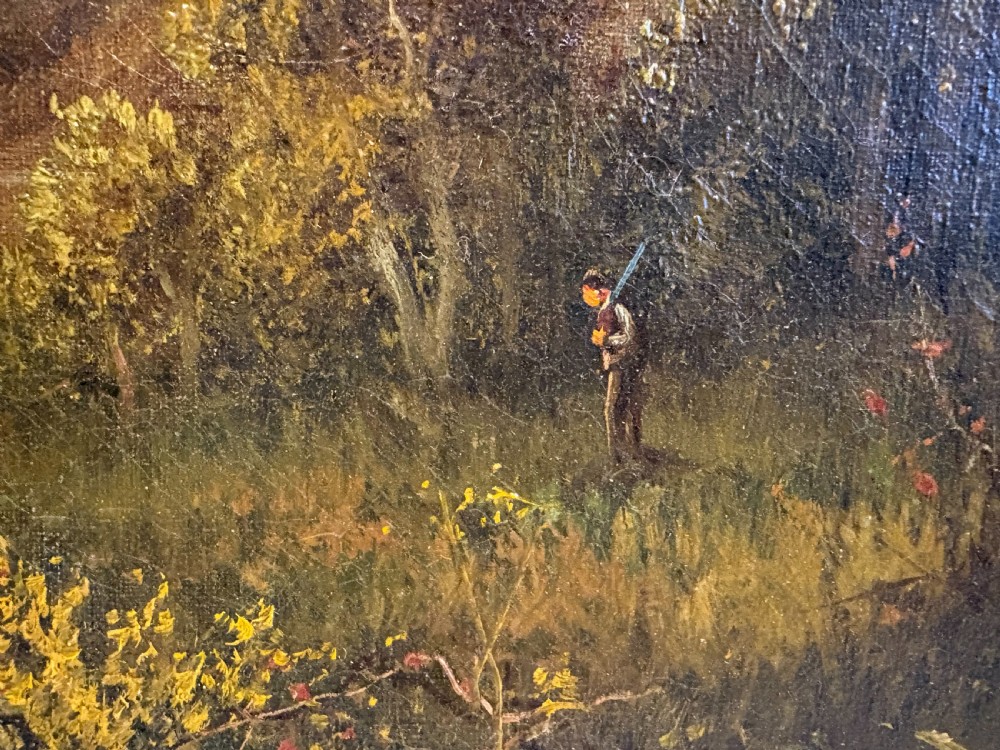 An antique oil painting on canvas depicting a mountainous lake landscape at sunset, housed in an ornate gilt frame. View V