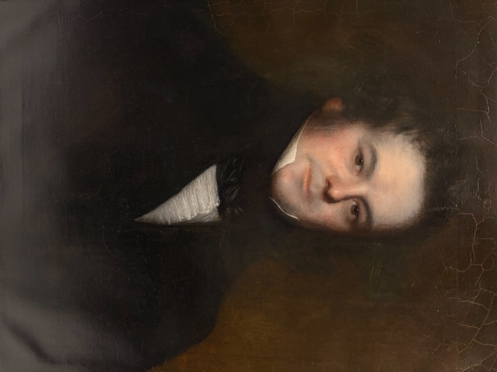 An early nineteenth-century oil portrait painting of a gentleman set inside an ornate gilt frame. View IV