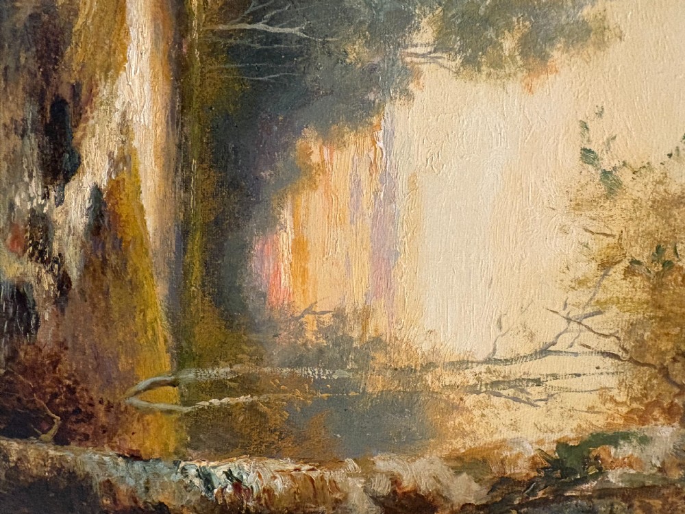 A framed vertical oil painting on canvas depicting a woodland stream at sunset with birch trees set inside a gold moulded frame. View V
