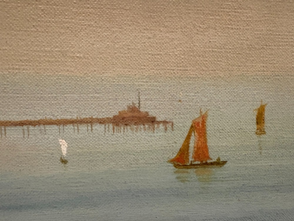 A late 19th-century oil painting on canvas depicting the rocky Scarborough coastline and sea with distant sailing boats, housed in a giltwood frame. View VI