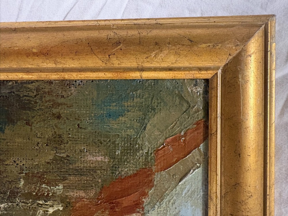A framed 1940s oil painting depicting a stone arched bridge over a reflective canal surrounded by continental town buildings in muted tones. View II