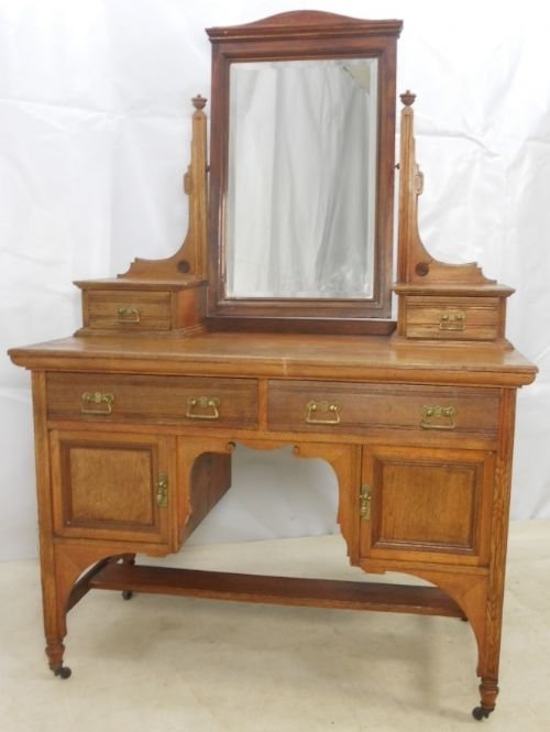 A Victorian Kneehole Ash Dressing Table