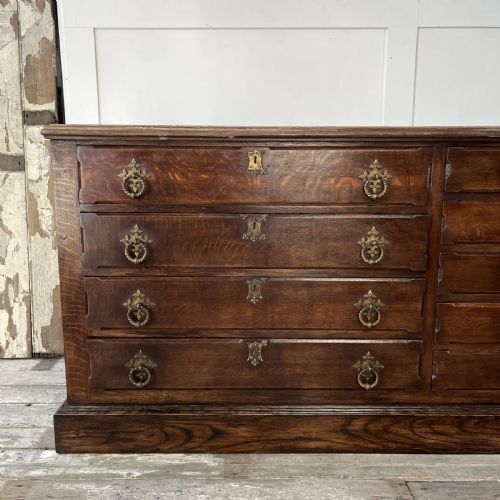 LARGE SOLID OAK BANK OF DRAWERS - ADDITIONAL PHOTO 1