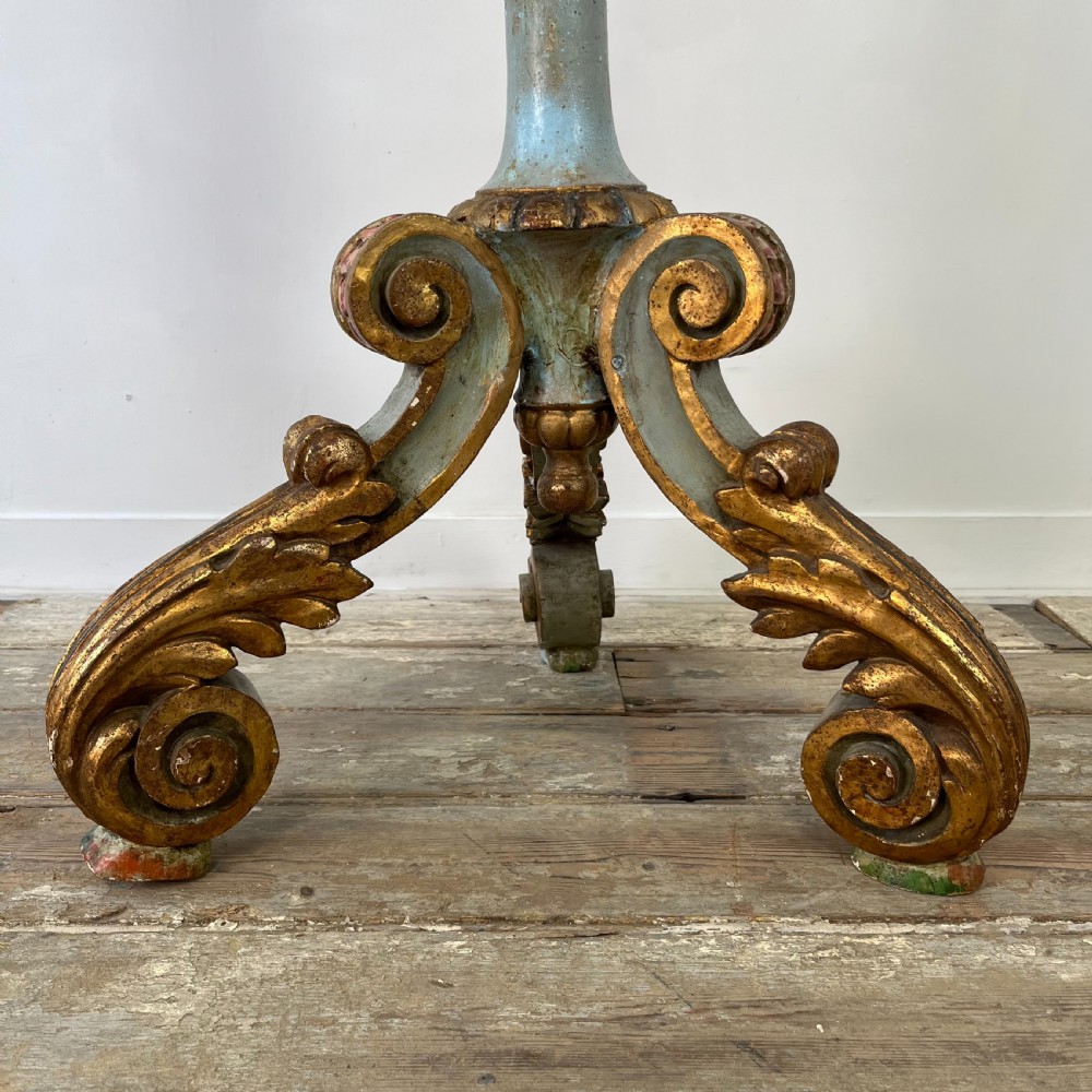 A tall 19th-century Italian carved giltwood and polychrome painted floor candlestick featuring a spiral column shaft resting on a tripod scroll base. View XIII