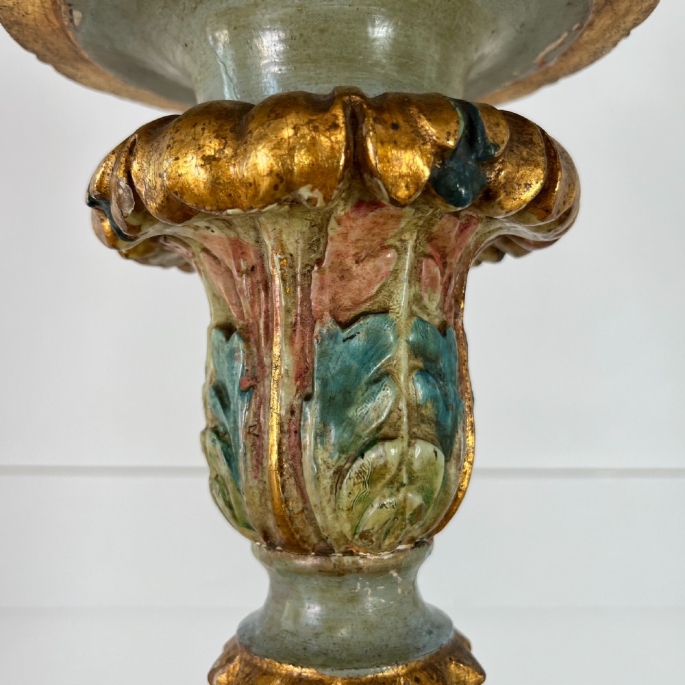 A tall 19th-century Italian carved giltwood and polychrome painted floor candlestick featuring a spiral column shaft resting on a tripod scroll base. View XVII