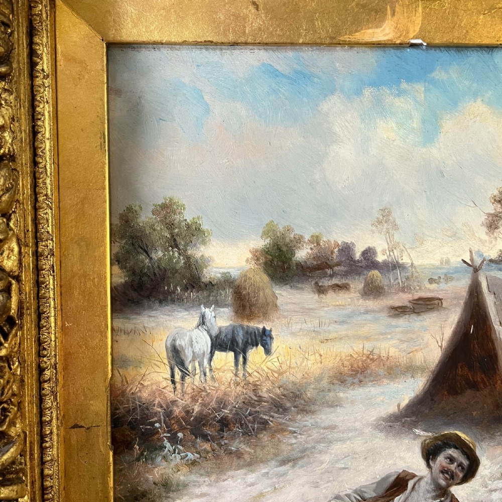 A pair of matching 19th-century oil paintings on board depicting rural peasant scenes in ornate carved gold gilt frames. View VIII