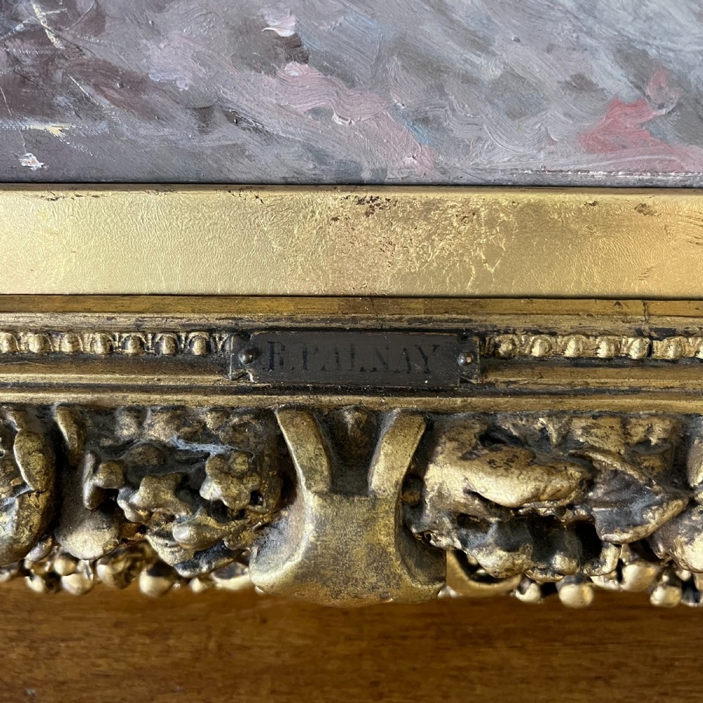 A pair of matching 19th-century oil paintings on board depicting rural peasant scenes in ornate carved gold gilt frames. View XX
