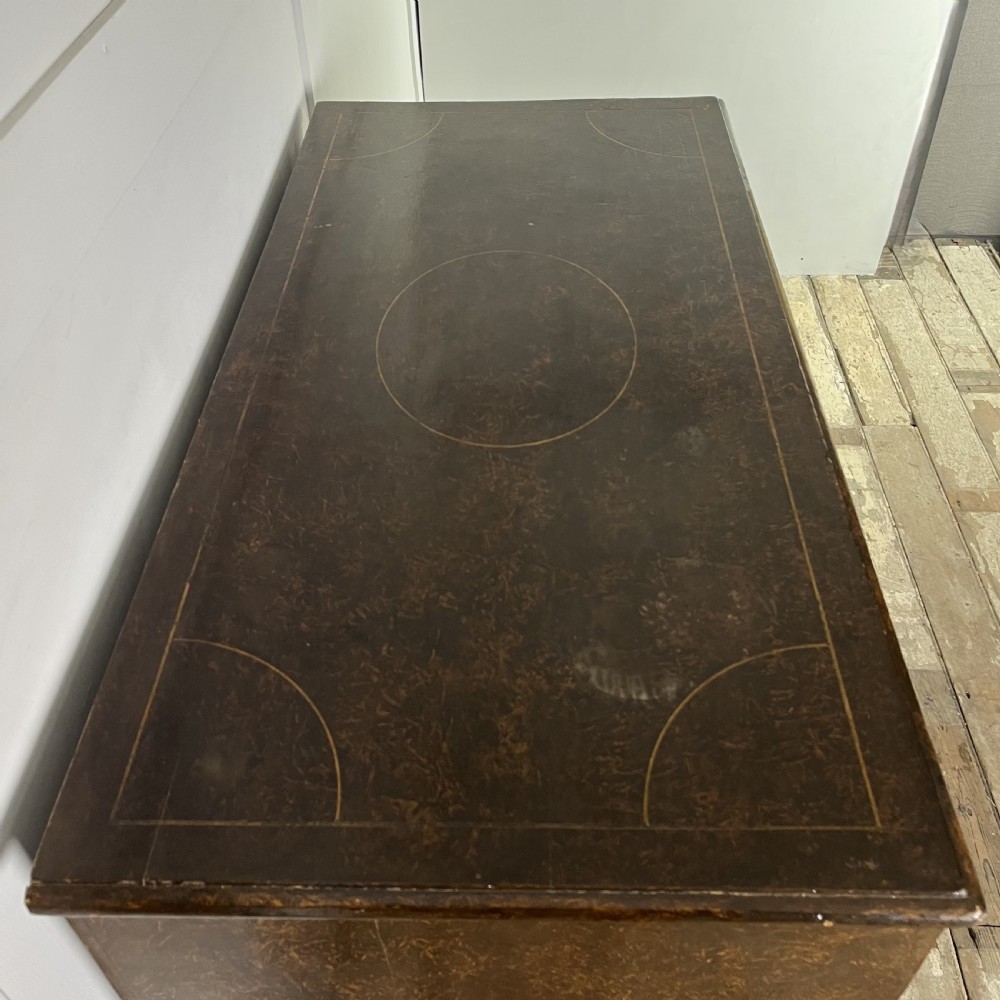 A nineteenth-century scumble-painted pine chest of drawers with decorative faux inlay lines, dark turned handles, and ball feet. View VIII