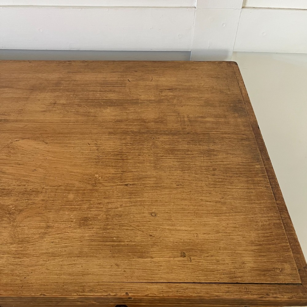 A large Victorian scumble painted pine chest of drawers featuring five graduated drawers and turned wooden knobs. View XII