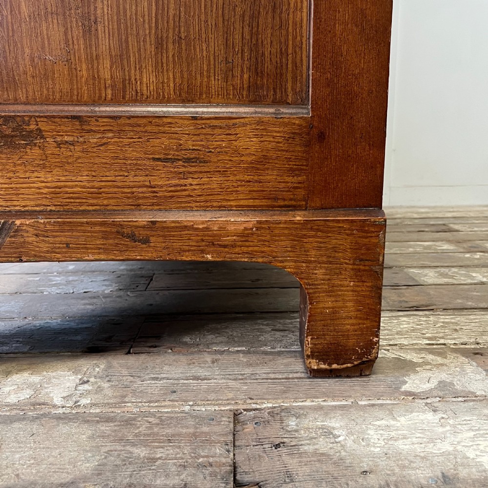 A large Victorian scumble painted pine chest of drawers featuring five graduated drawers and turned wooden knobs. View XVII