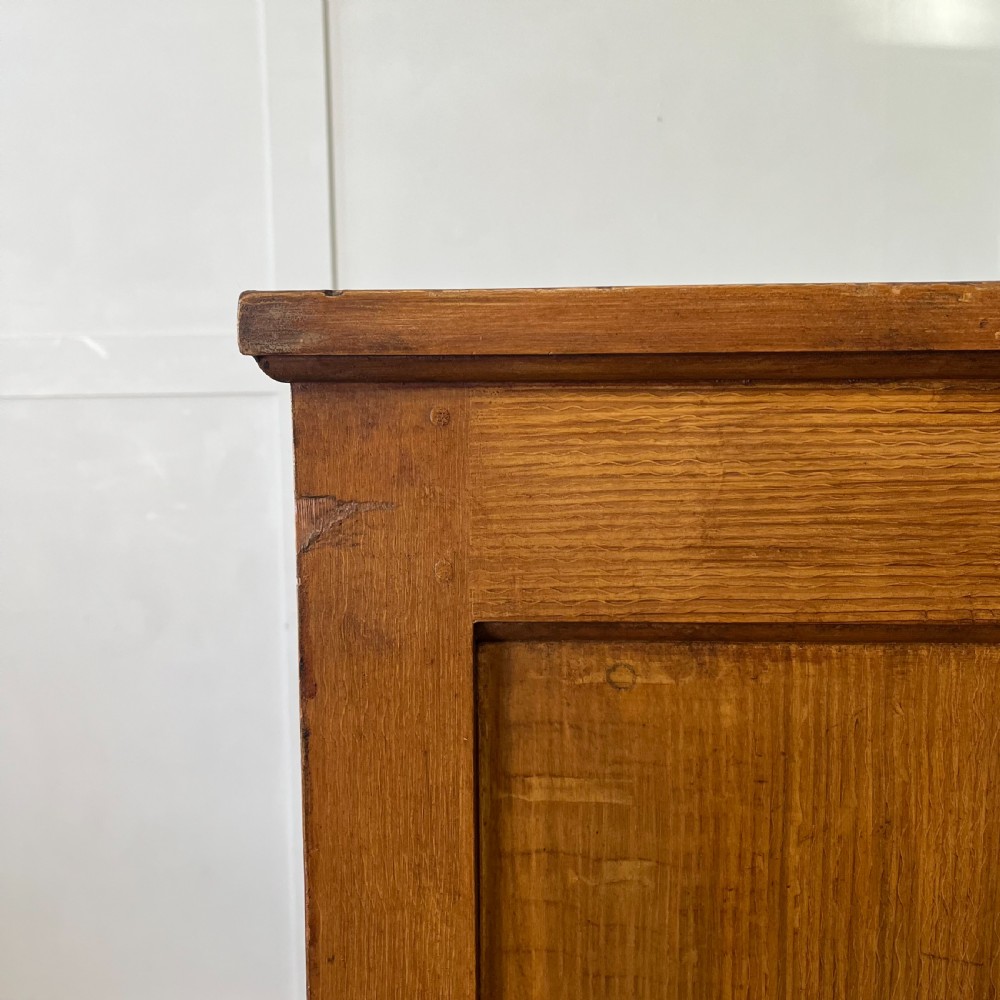 A large Victorian scumble painted pine chest of drawers featuring five graduated drawers and turned wooden knobs. View XVIII