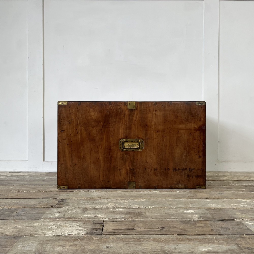 A nineteenth-century rectangular wooden desktop campaign chest featuring two drawers, flush brass drop handles, and brass corner straps. View VIII