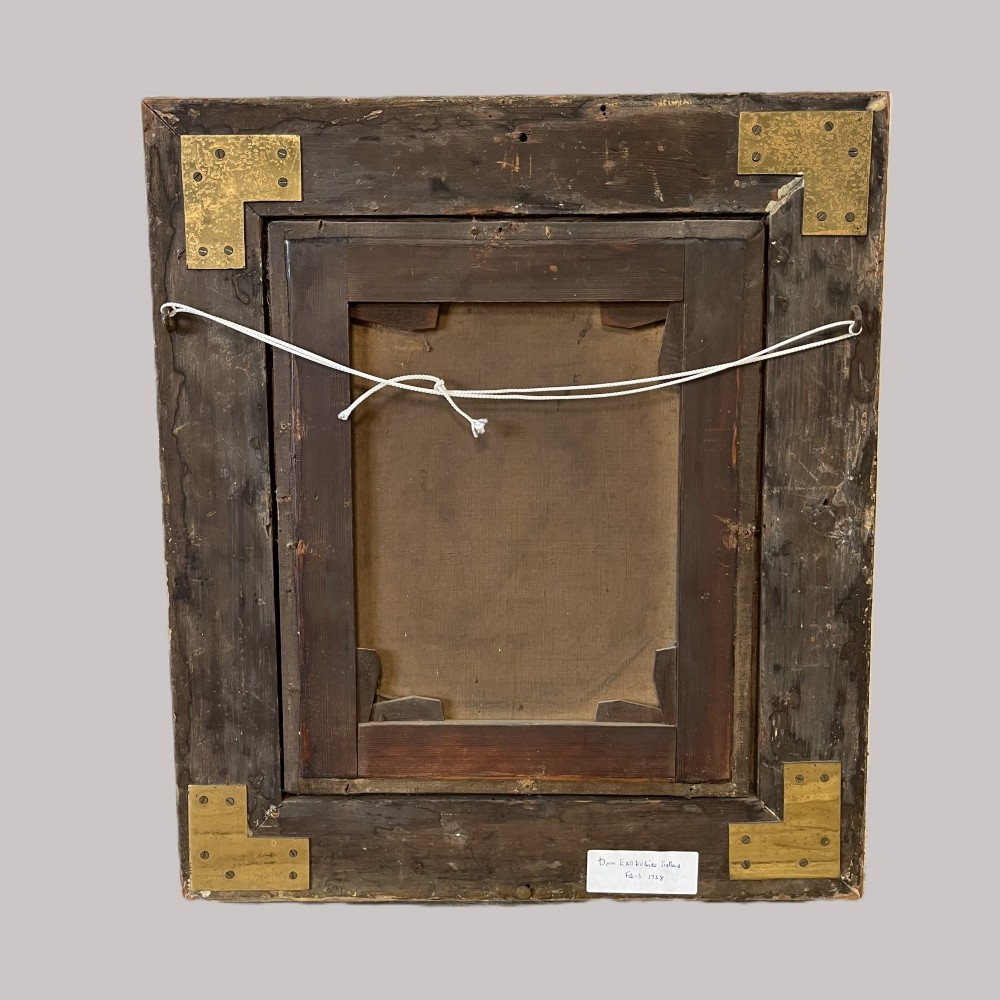 A nineteenth-century oil portrait depicting a seated gentleman resting his chin on his hand, presented in an elaborate gilded swept frame. View XIV