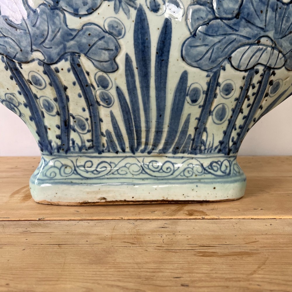 An extra large blue and white Chinese style porcelain moon flask decorated with a carp among lotus blossoms and styled with twin dragon handles. View III