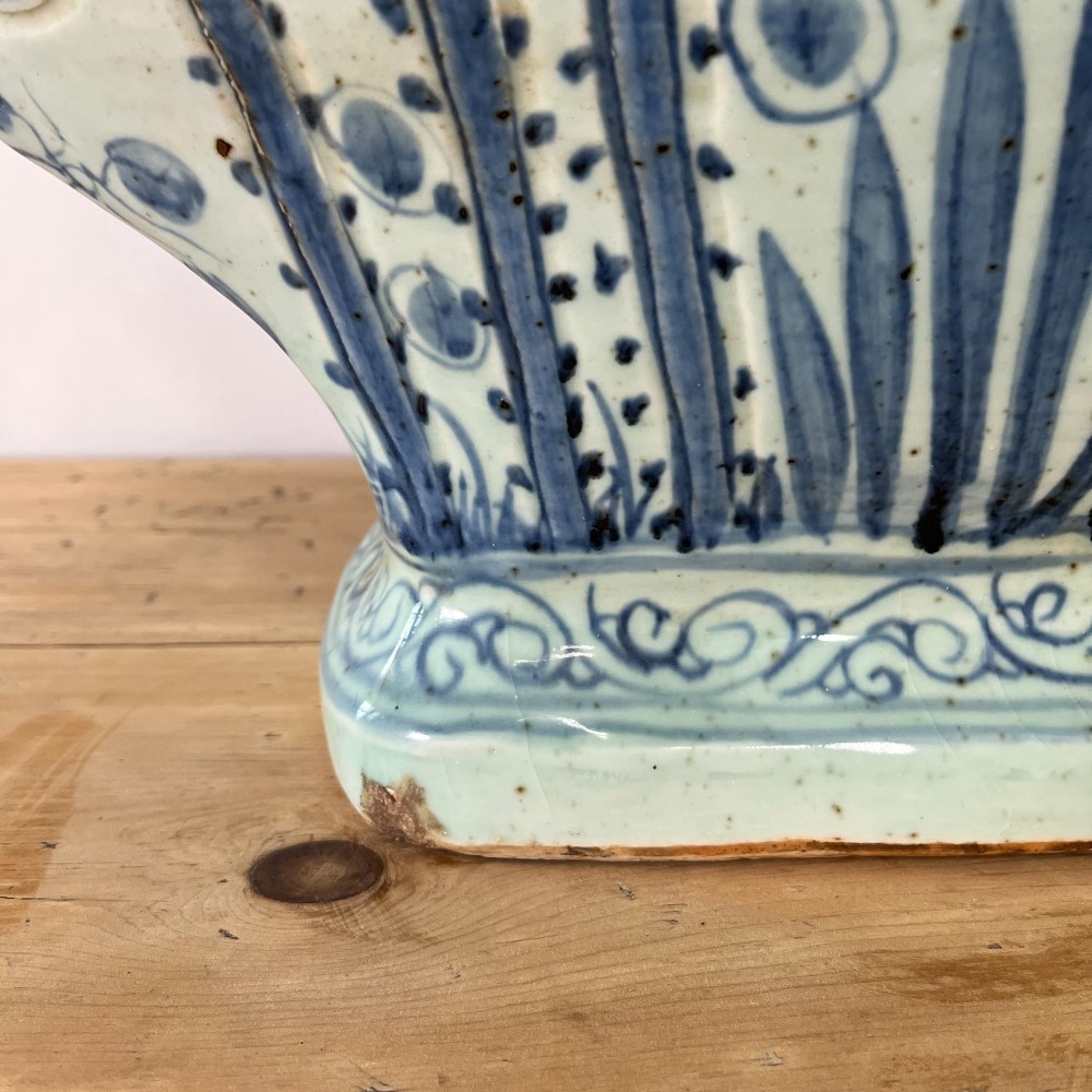 An extra large blue and white Chinese style porcelain moon flask decorated with a carp among lotus blossoms and styled with twin dragon handles. View X
