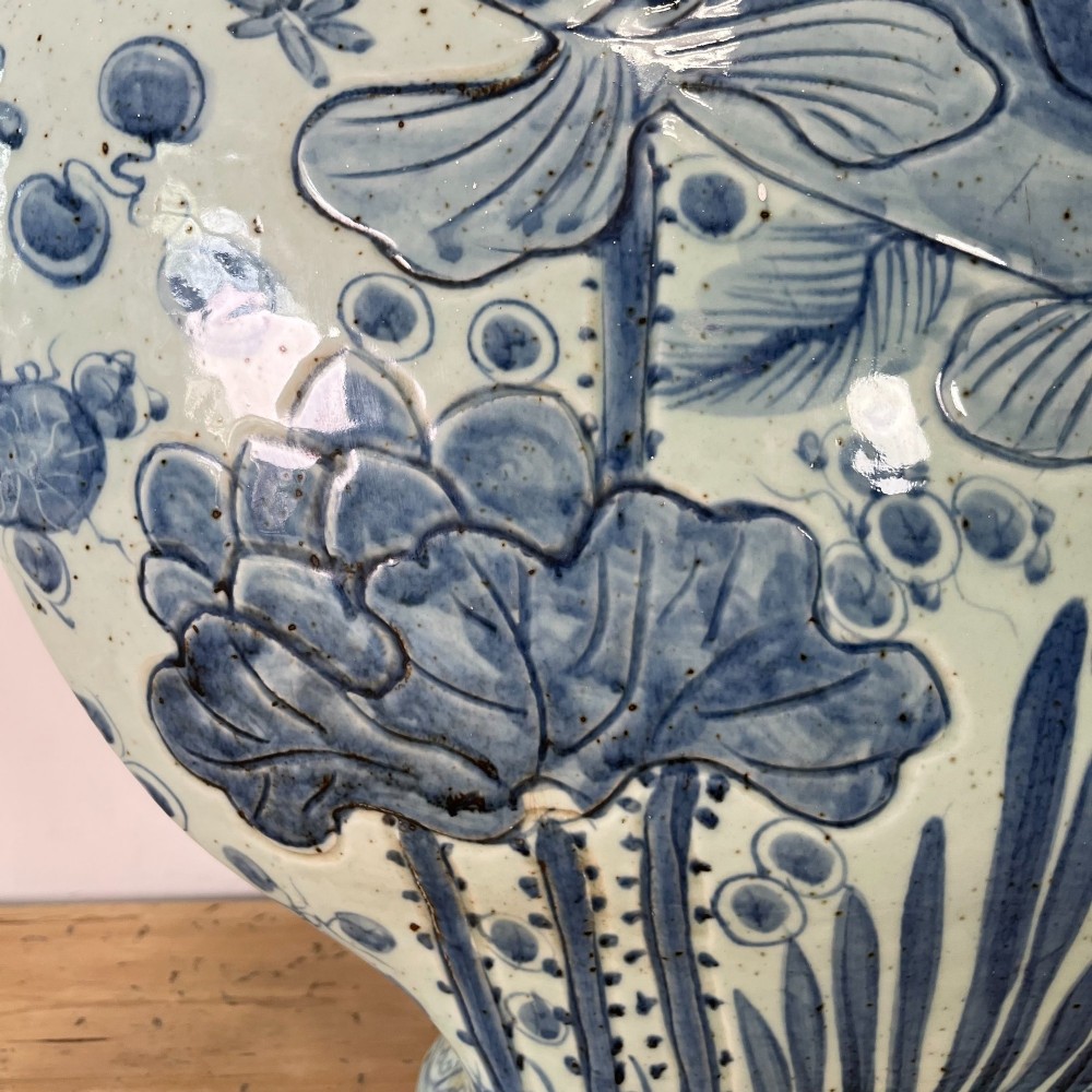 An extra large blue and white Chinese style porcelain moon flask decorated with a carp among lotus blossoms and styled with twin dragon handles. View XI