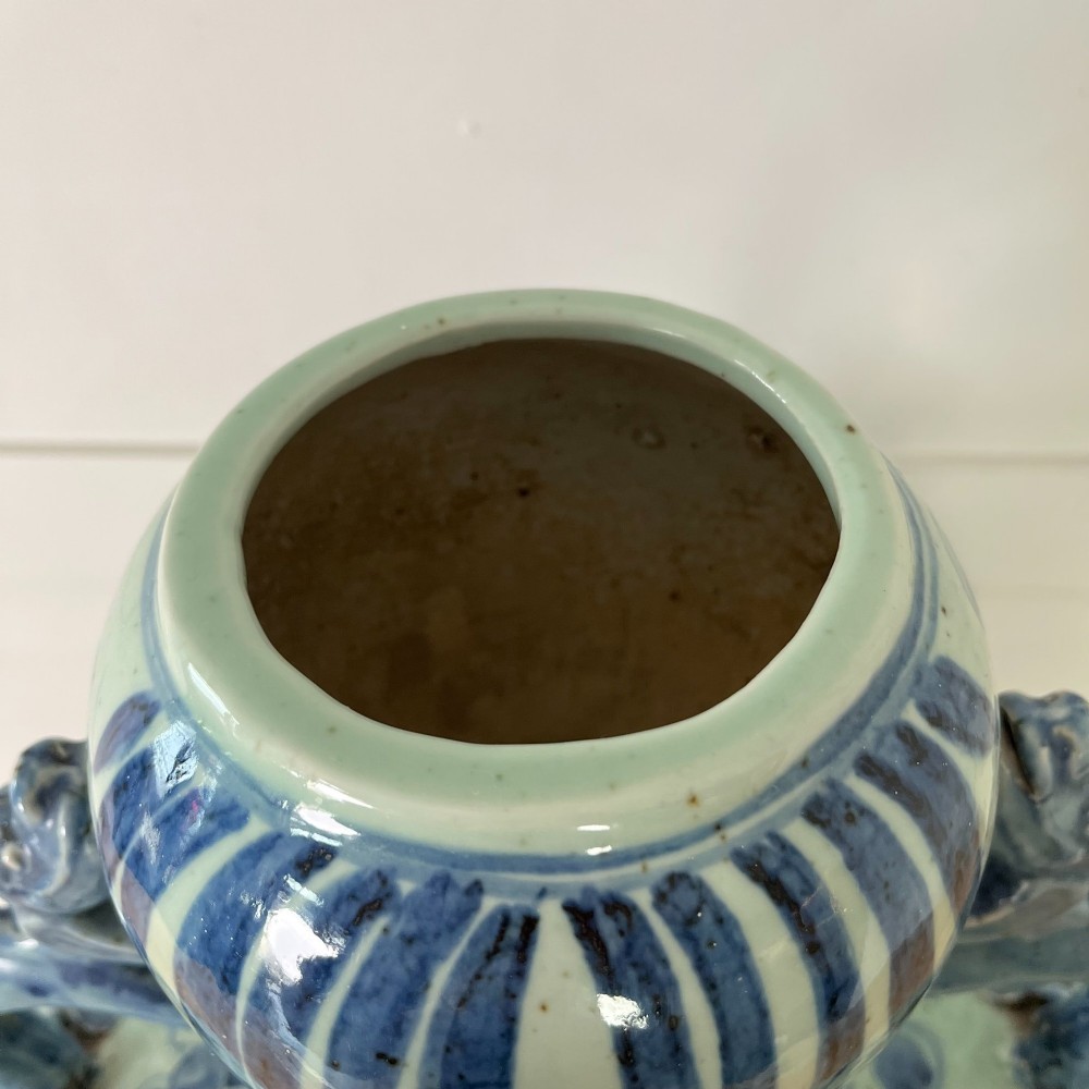 An extra large blue and white Chinese style porcelain moon flask decorated with a carp among lotus blossoms and styled with twin dragon handles. View XIII