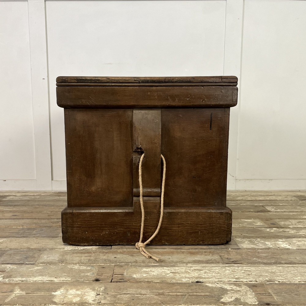 An early 20th-century pine carpenters chest featuring an upper hinged lid and multiple shallow lower drawers with small round knobs. View XII