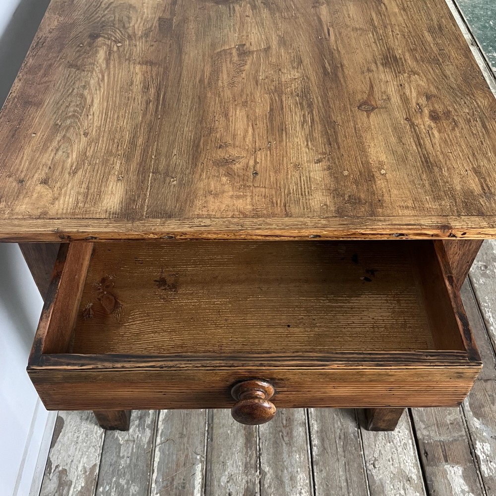 A long 19th-century pine farmhouse dining table with tapered square legs and a warm brown waxed finish. View IX