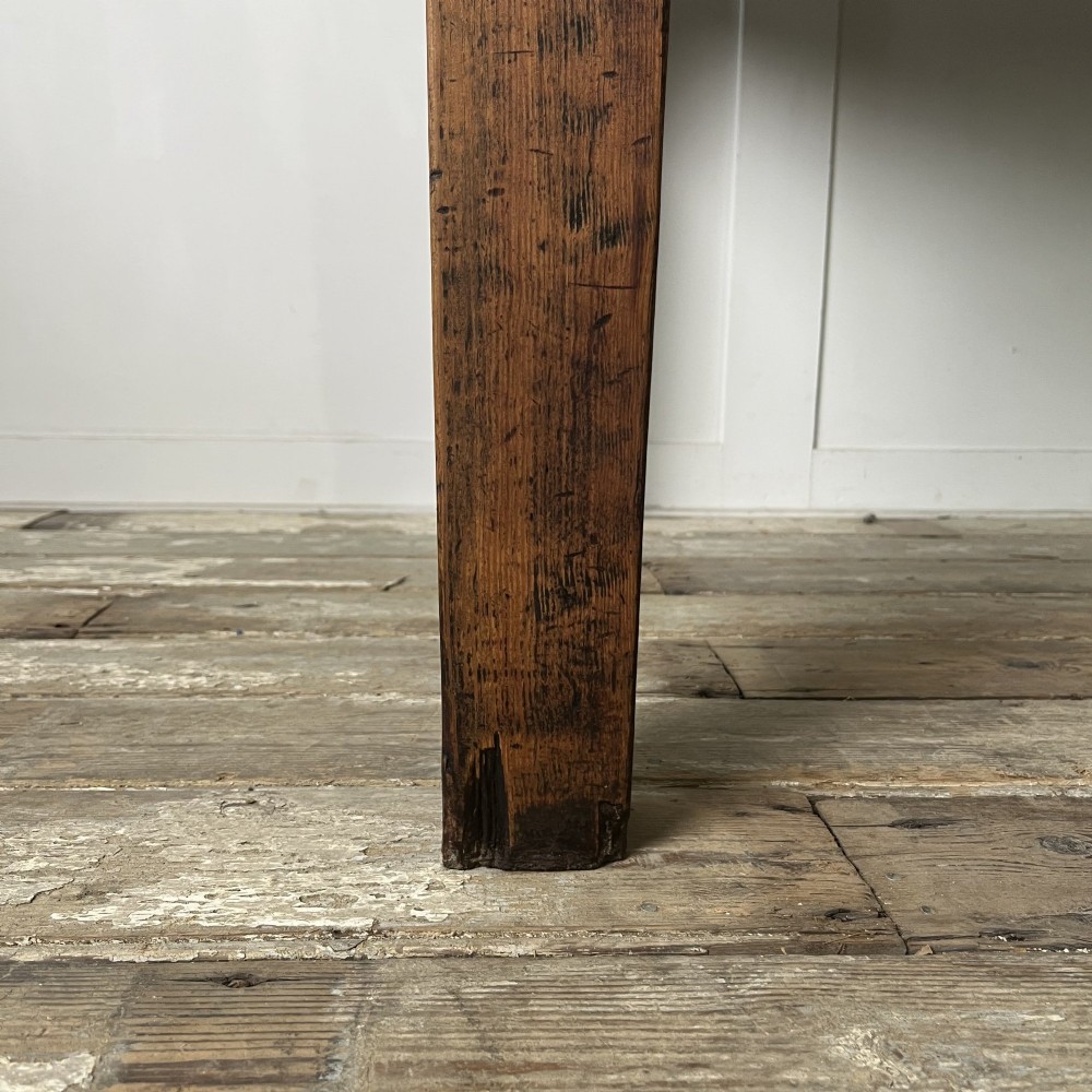 A long 19th-century pine farmhouse dining table with tapered square legs and a warm brown waxed finish. View XIII