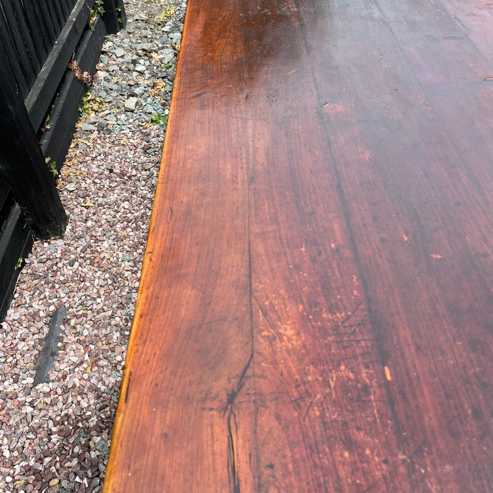 A 3.8-metre long 19th-century French cherrywood farmhouse dining table supported by six tapered square legs. View VIII
