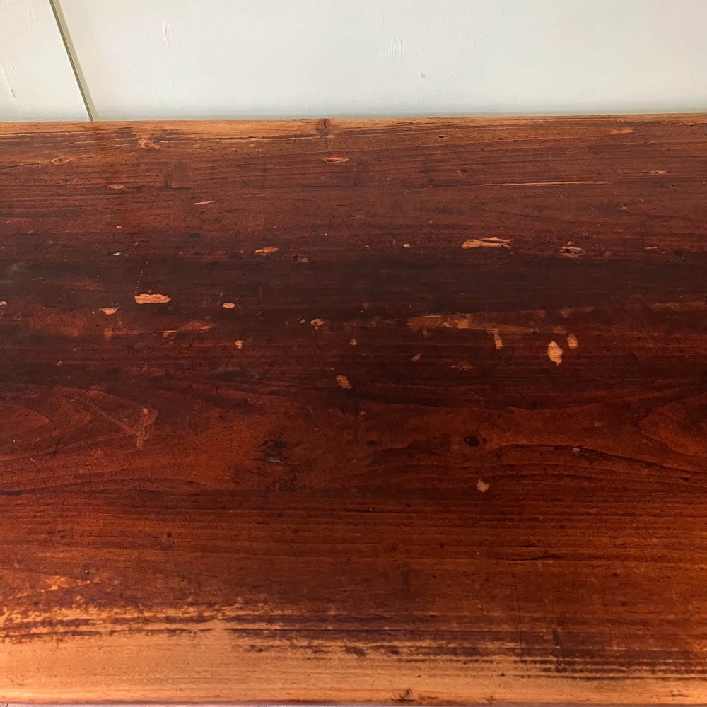 A nineteenth-century French cherrywood farmhouse dining table featuring tapered square legs and a rectangular plank top. View XI