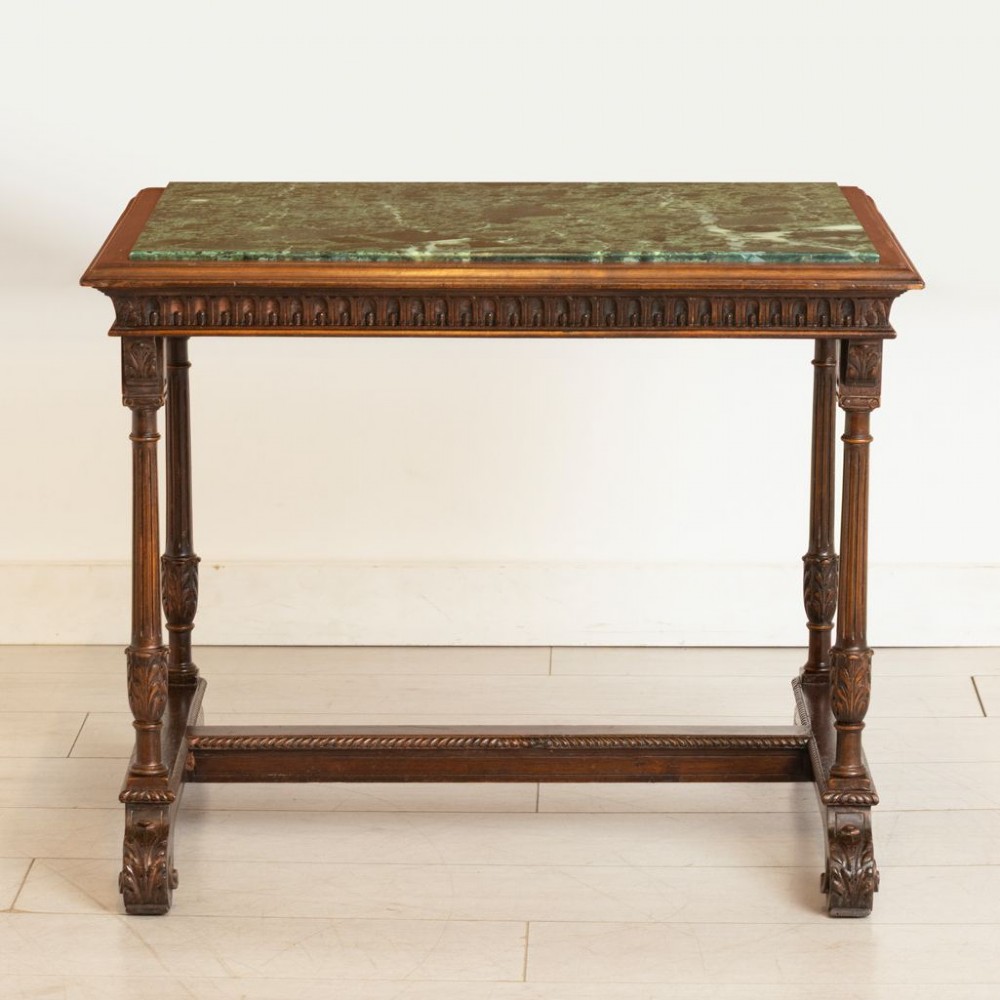 A 19th-century rectangular mahogany side table featuring a carved fluted apron, turned legs with an H-stretcher, and an inset green marble top. View II