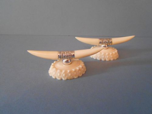 stunning pair of ivory and silver knife rests - CATEGORY: ANTIQUE SILVER - DATED 1920