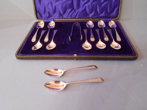 CASED SET OF 12 ANTIQUE SOLID SILVER TEASPOONS SUGAR TONGS 1918 - ADDITIONAL PHOTO 1