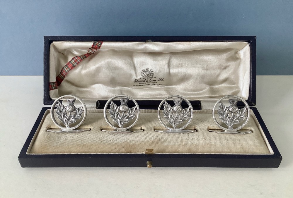 Cased Set of Antique Silver Thistle Menu Holders