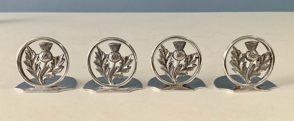 Cased Set of Antique Silver Thistle Menu Holders View II