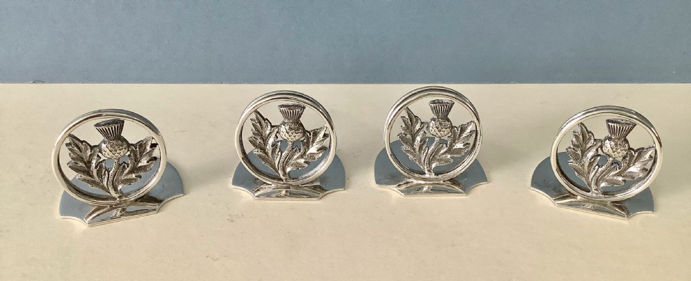 Cased Set of Antique Silver Thistle Menu Holders View VI