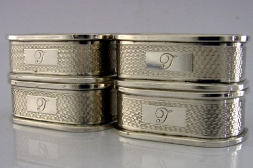 FOUR ENGLISH SOLID STERLING SILVER ENGINE TURNED NAPKIN RINGS 195960 - ADDITIONAL PHOTO 2