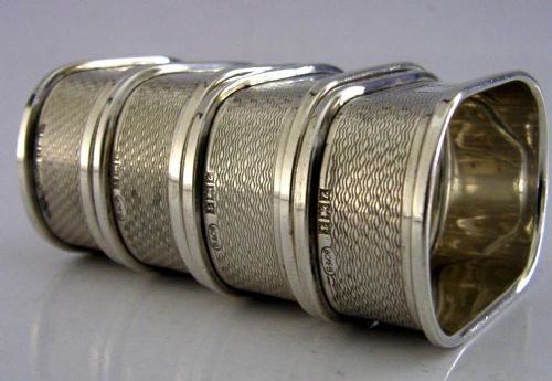 FOUR ENGLISH SOLID STERLING SILVER ENGINE TURNED NAPKIN RINGS 195960 - ADDITIONAL PHOTO 3
