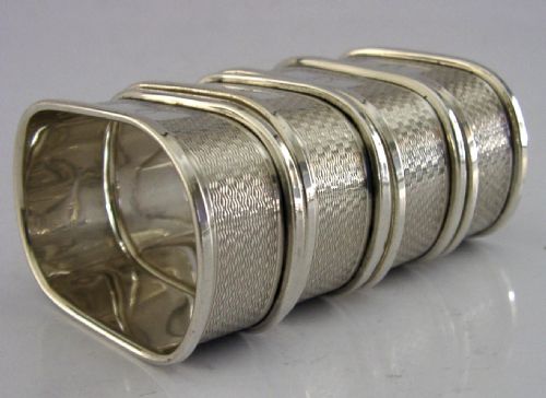 FOUR ENGLISH SOLID STERLING SILVER ENGINE TURNED NAPKIN RINGS 195960 - ADDITIONAL PHOTO 4